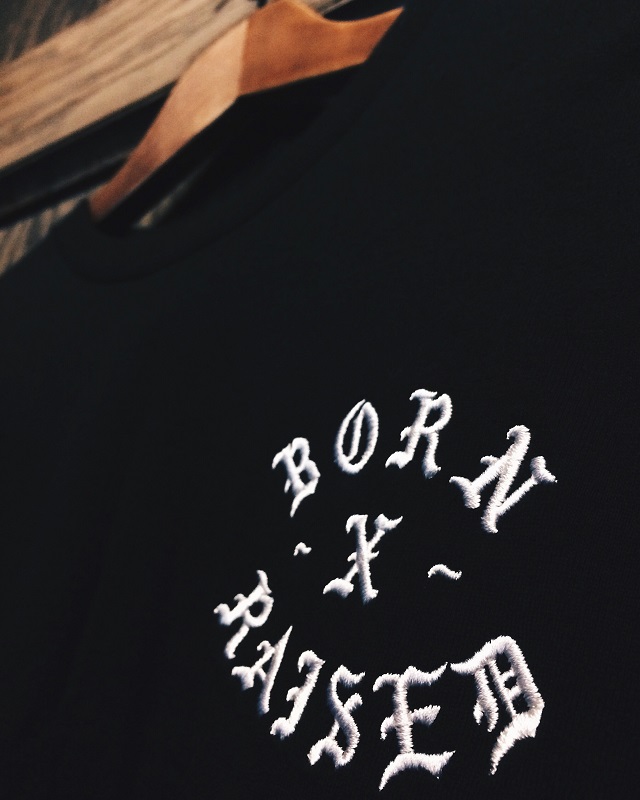 BORN X RAISED EMBROIDERY ROCKER TEE AVAILABLE IN STORE AND ONLINE